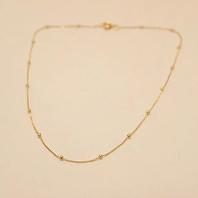 Colar Choker com Bolinhas Lisa no Dourado